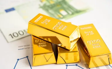 gold-bar-on-graph-with-eu-banknote-economy-finance-exchange-trade-investment-concept